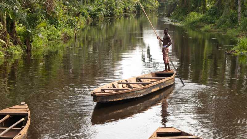 Hop on a pirogue on the Black River to reach a small traditional village - Highlights of Ghana, Togo and Benin, Ghana