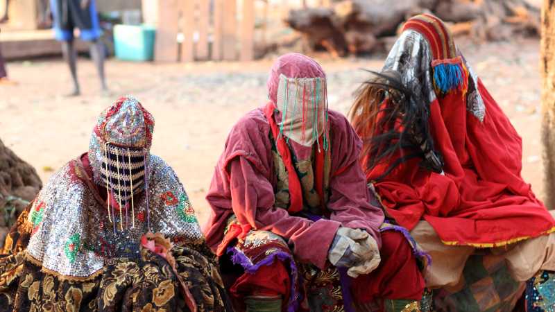 Ceremonial masedk dancers in Benin