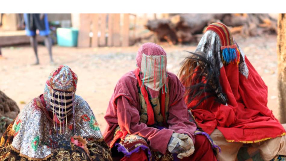 Ceremonial masedk dancers in Benin