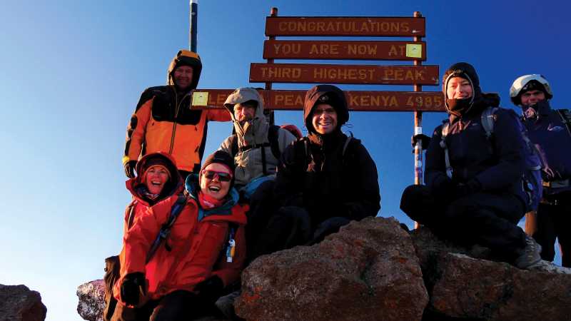 Group photo at Point Lenana upon Mount Kenya - Twin Peaks of Africa, Kenya