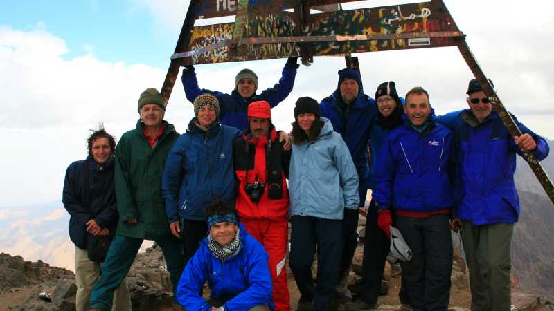 Group on the summit of Jebel Toubkal, the tallest peak in Morocco's High Atlas Mountains | John Millen