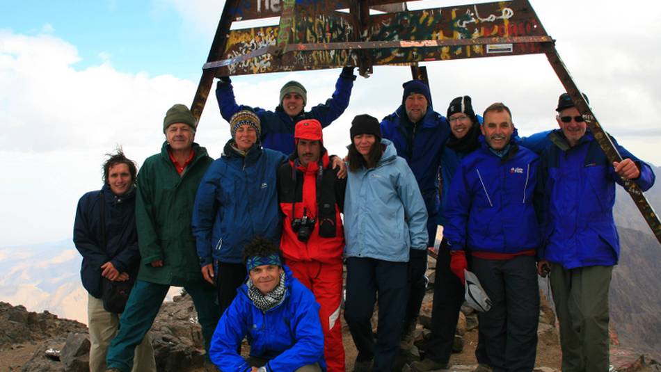 Group on the summit of Jebel Toubkal, the tallest peak in Morocco's High Atlas Mountains | John Millen