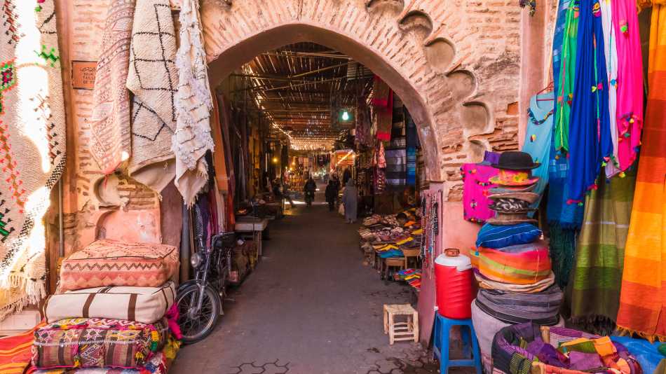 Wander through the vibrant souks and markets of Marrakesh