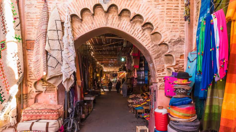 Wander through the vibrant souks and markets of Marrakesh