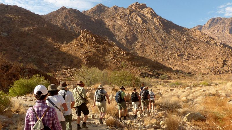 Brandberg Mountain walking through a rocky desert valley, Namibia - Namibia and Botswana Explorer, Zambia
