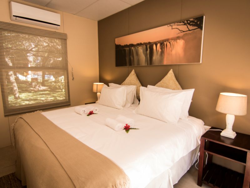 Double room with air conditioning at Zambezi Waterfront Lodge, Livingstone, Zambia
