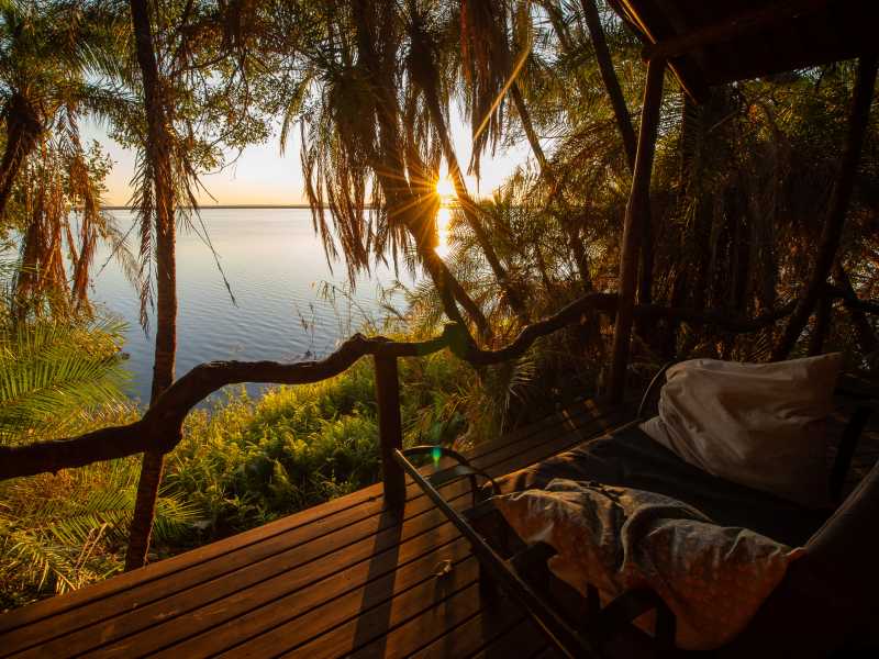 Okavango Delta: Guma Lagoon
Riverside accommodation on the Okavango Delta, set among its waterways and lagoons, where your stay supports the local community through employment, school partnerships and mentoring programs in guiding and hospitality. | Bruce Taylor