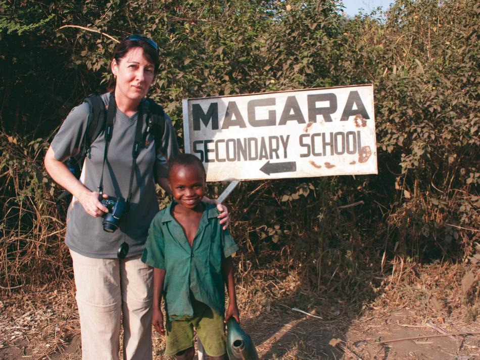 A participant on CPT 2010 Tanzania project with school student from the school that the project renovated -  Photo: Vicki Potts