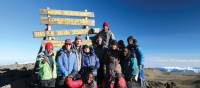 Trekkers and guide group on Kilimanjaro Uhuru Summit | Kyle Super