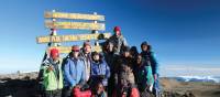 Trekkers and guide group on Kilimanjaro Uhuru Summit | Kyle Super