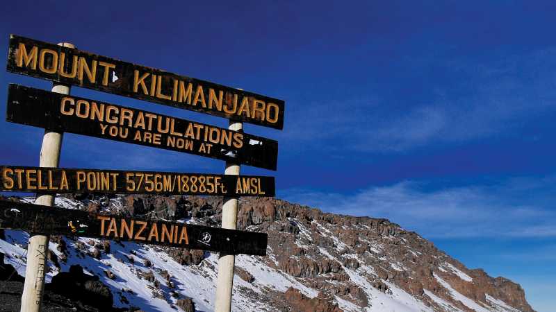 Blue skies overhead as we arrive at Stella Point in Tanzania | Heike Krumm