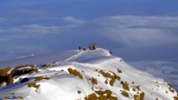 Summit the highest point Uhuru Peak on the volcano Kibo, 5,895 metres