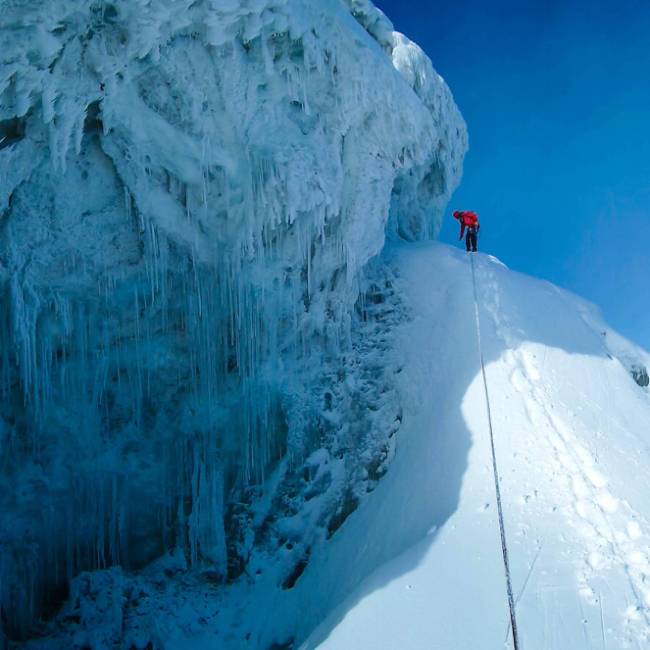 Climber ascencding Margherita Peak