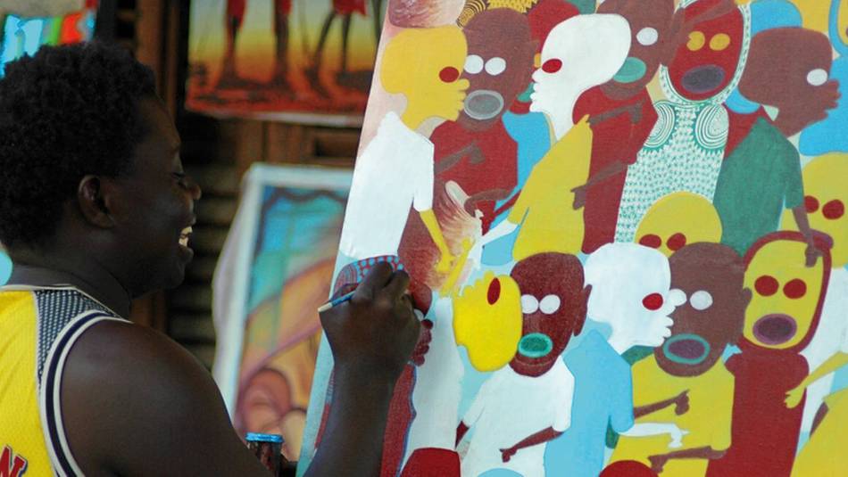 Artist on the colourful streets of Zanzibar | Sue Badyari