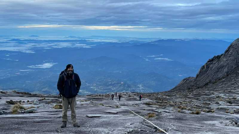 Head to the summit for dawn for specatacular views back down to Kota Kinabalu | Brad Atwal
