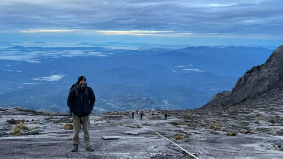 Head to the summit for dawn for specatacular views back down to Kota Kinabalu | Brad Atwal