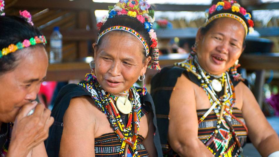 Iban women in traditional dress | David Kirkland