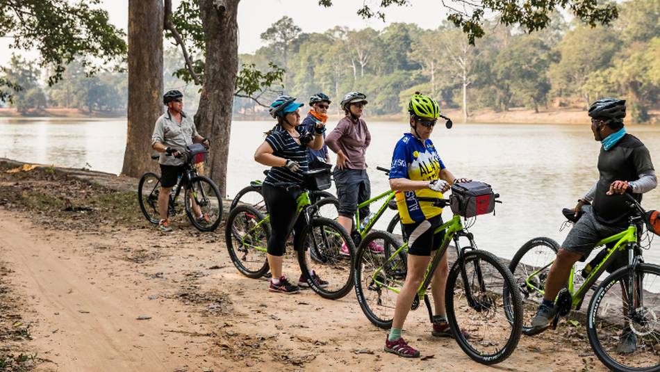 Cycling towards the ruins of Angkor Wat in Cambodia | Lachlan Gardiner