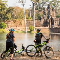 Cycling is a great way to take in even more of the ruins of Angkor Wat | Lachlan Gardiner