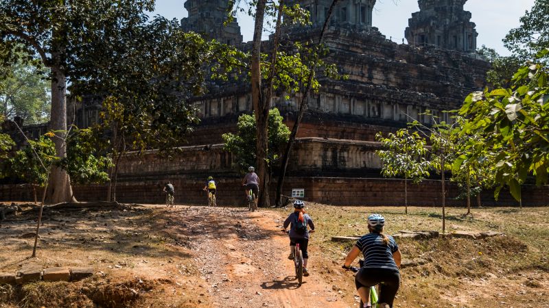 Exploring the ruins of Angkor Wat by bike is a unique way to discover the UNESCO listed site - Bike, Hike & Kayak Laos and Cambodia, Laos