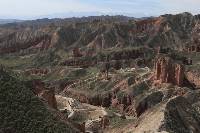 Hike the trails winding through the Binggou Danxia Geopark