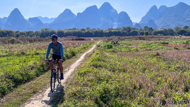 Cycling in a limestone karst landscape, Yangshou