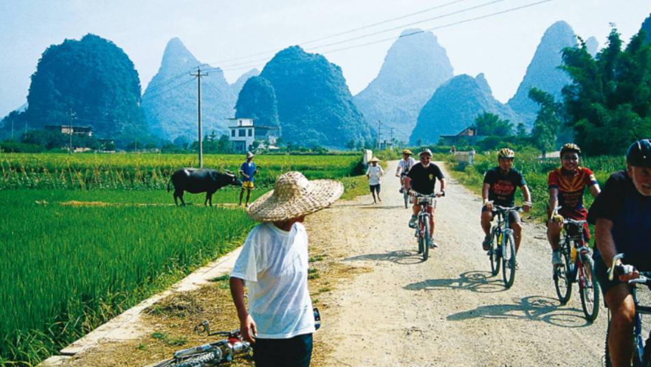 Cycling through rural villages Yangshuo, China | Scott Pinnegar