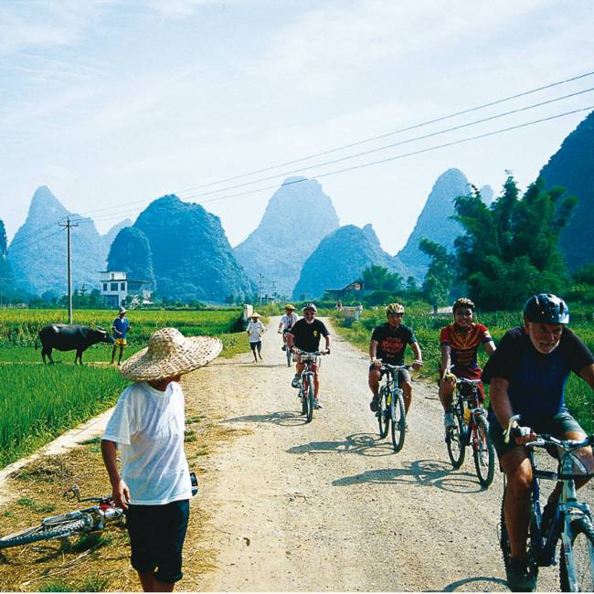 Cycling through rural villages Yangshuo, China | Scott Pinnegar