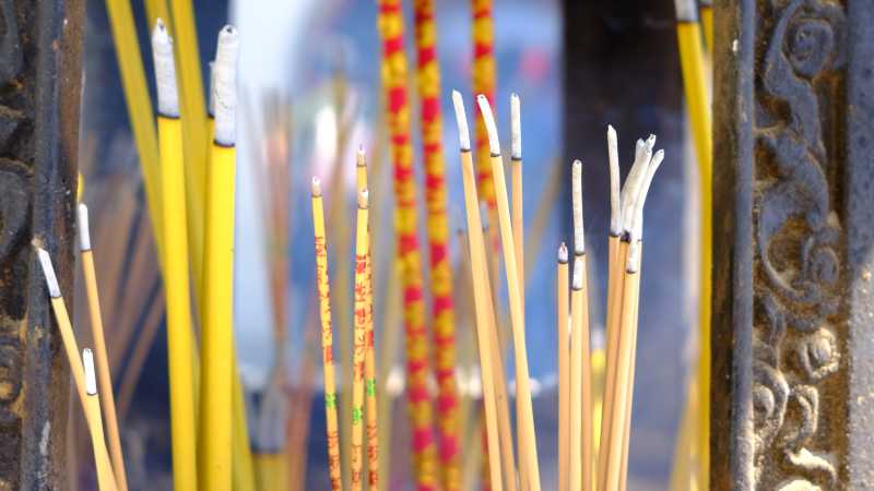 Incense sticks at village temple | Marion Wheeler