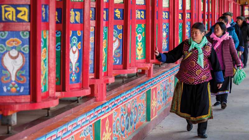 Spinning prayer wheels, Labrang Monastery | Richard I'Anson