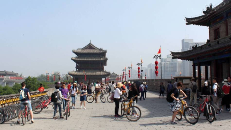 Cyclists on the old Xian city wall. | Alana Johnstone