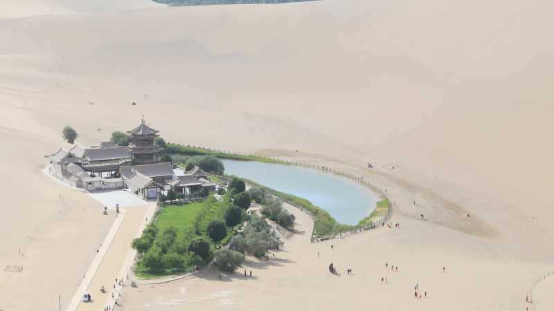 The famous singing dunes & crescent lake of the Gobi Desert, Dunhuang.