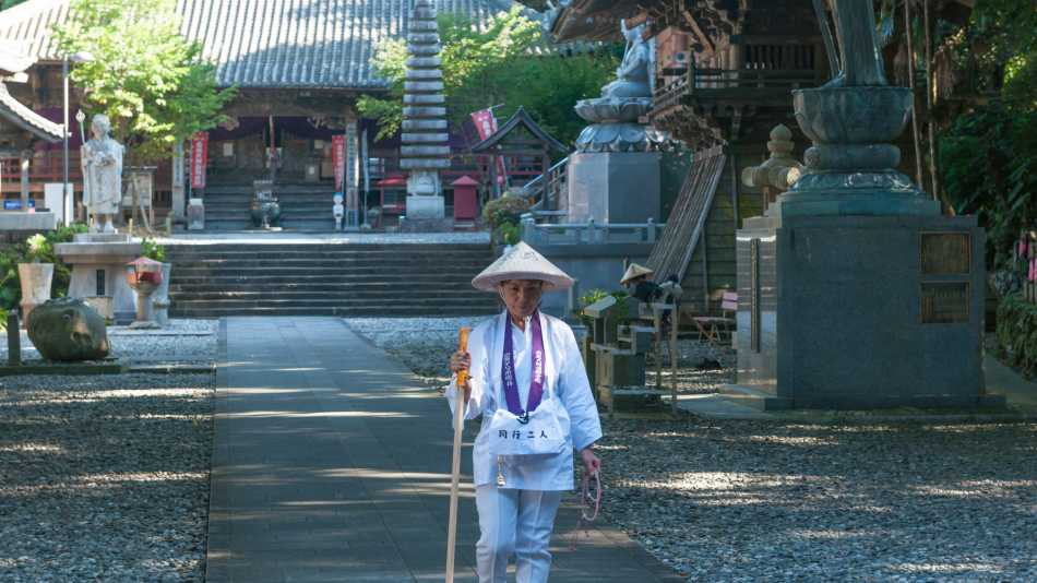 A Pilgrim continuing his journey to the next temple in Shikoku