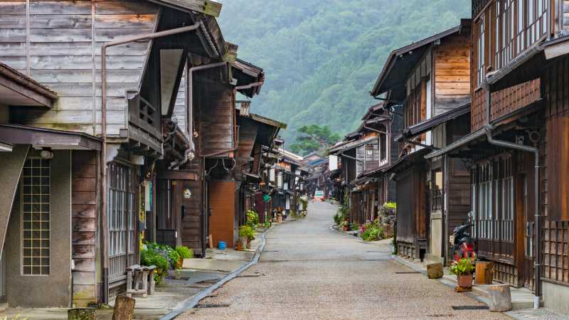 Traditional wooden houses line the Nakasendo Way