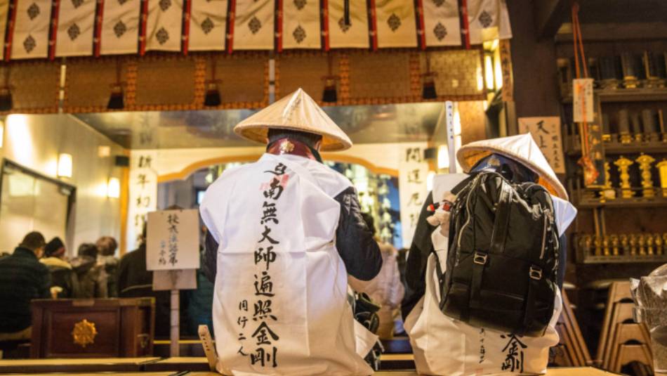 Shikoku Pilgrim Walk Buddhists at a shrine