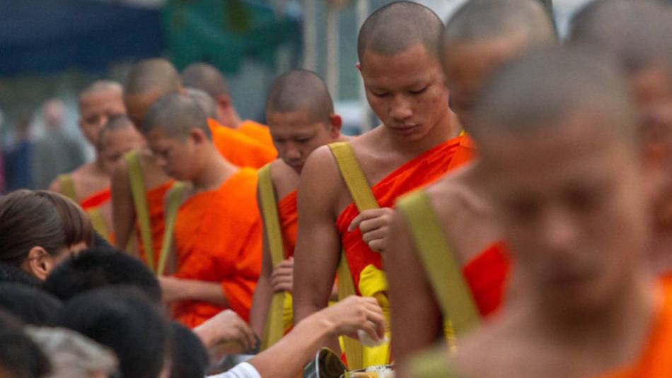 The centuries old daily Alms giving ritual, Tak Bat.
