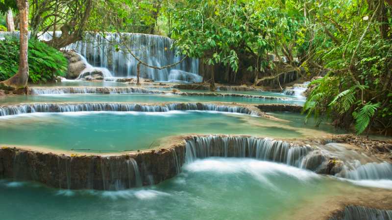 The enchanting turquoise pools of Kuang Si Falls