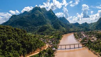 A view of Nong Khiaw on the banks of the Nam Ou River, Laos.