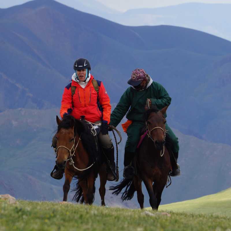 On horseback in a remote river valley in Mongolia