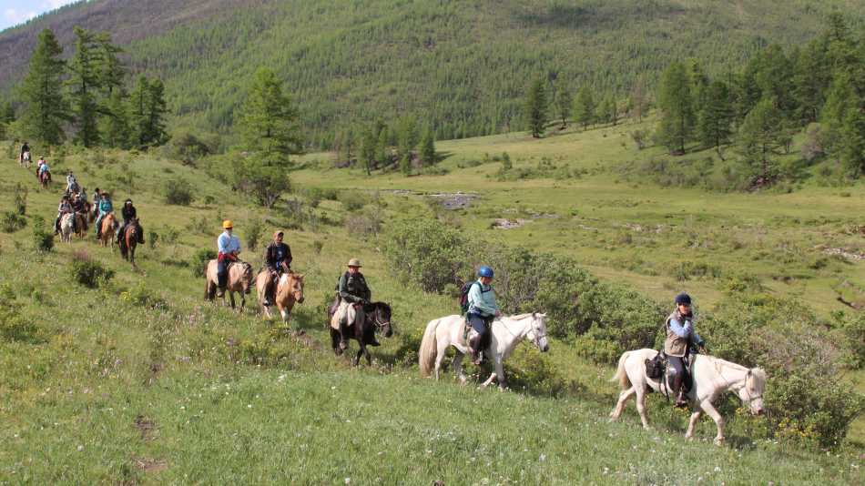 Horse riding deep into the Khan Khentii National Park