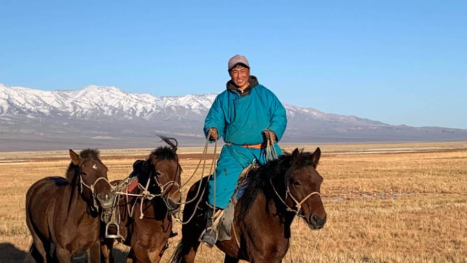 Our local herders help manage the horses during our trek to Tsast Bogd Mountain | Tim Cope