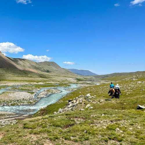 Turquoise glacial waters lead the way into Mongolia's remote western ranges