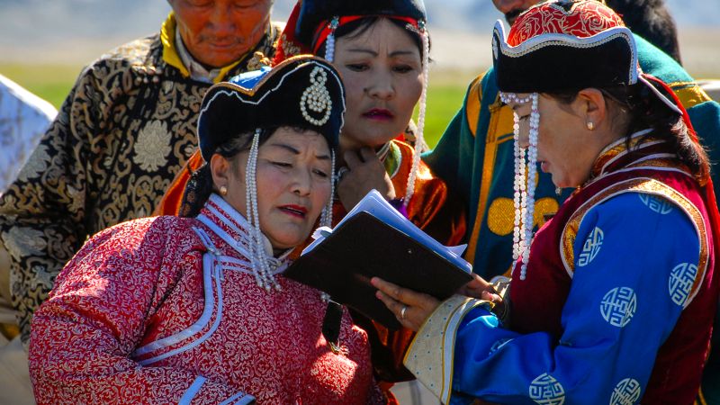 Locals dressed in their best attire during Naadam Festival - Tavan Bogd Trek Naadam Extension, Mongolia