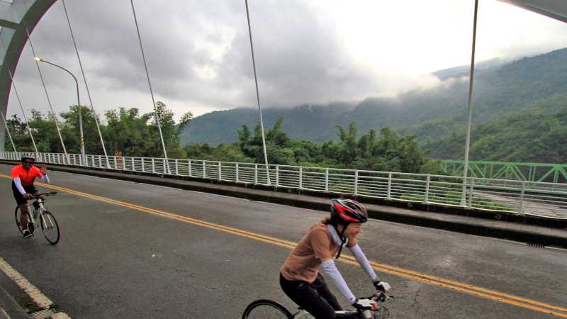 Following a winding river valley through mountain scenery, Taiwan - Taiwan Cycle: Mountains, Culture & Coast, Taiwan