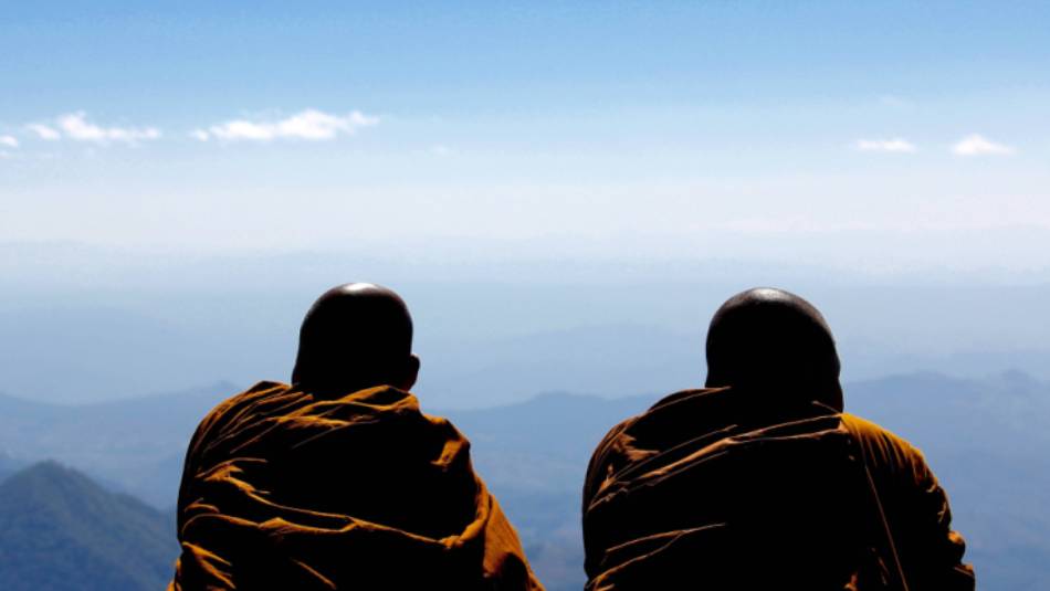 Monks gaze out across Doi Inthanon, Thailand's highest point. | Sarah Mason