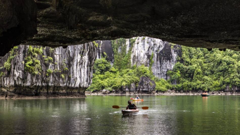 Peeking through the caves of Halong Bay, Vietnam | Richard I'Anson
