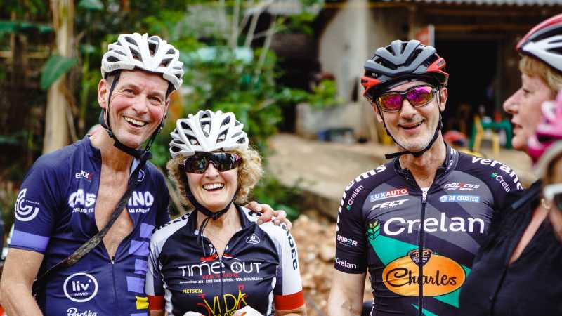 Cycling group taking a rest en route to Pu Luong,