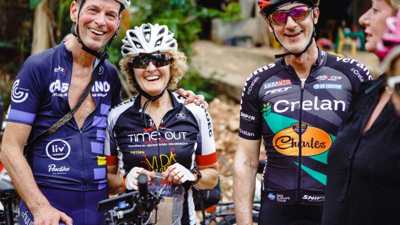 Cycling group taking a rest en route to Pu Luong,