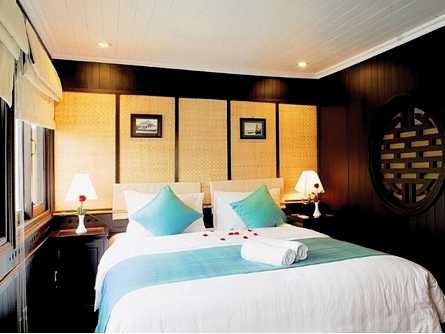 Luxurious double deluxe cabin on the Bhaya Classic boat cruise at Halong bay, Vietnam