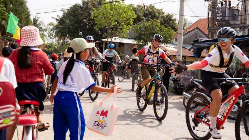 Greeting school students, rural Vietnam